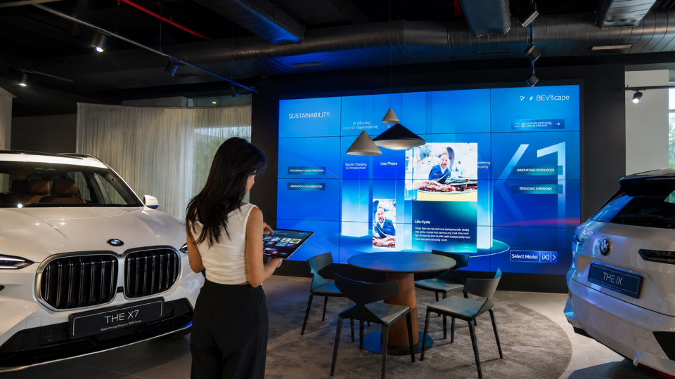 BMW electric vehicle experience center with interactive display